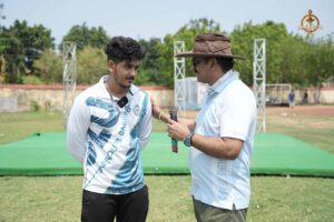 Faculty member discussing strategy with a cricket player during Ranbhoomi at Brahmastra 2025