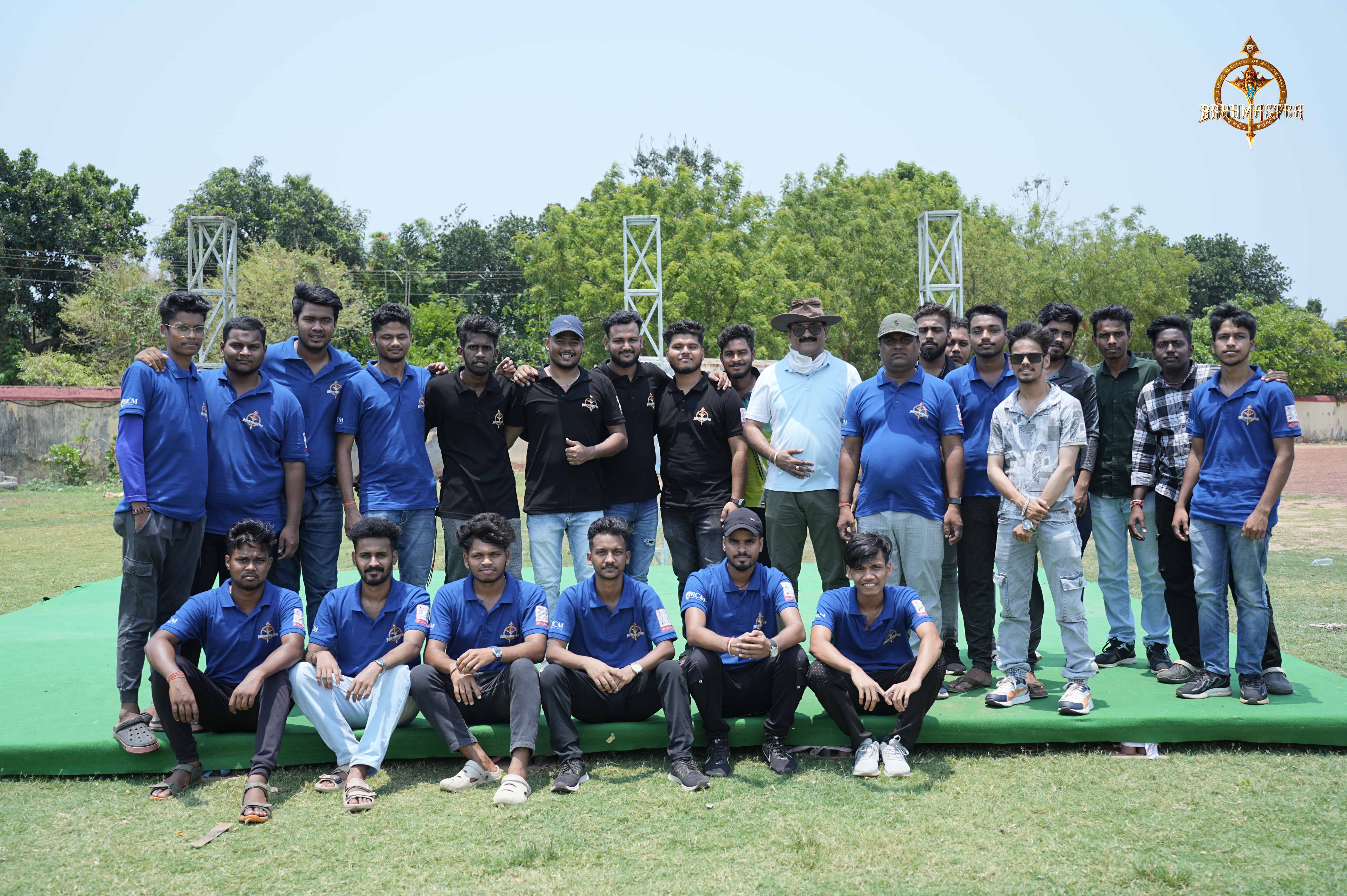 Group of cricket players from various colleges posing together during the Ranbhoomi event at Brahmastra 2025.