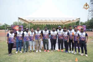 Group photo of cricket team players from a participating college at Ranbhoomi during Brahmastra 2025.