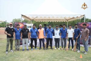cricket team poses together on the field during Ranbhoomi at Brahmastra 2025, wearing coordinated jerseys.