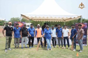 Cricket team posing together in uniform at Brahmastra 2025 Ranbhoomi tournament