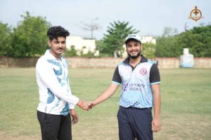 Players from another colleges shake hands after a cricket match at Ranbhoomi, Brahmastra 2025, showing sportsmanship and unity.