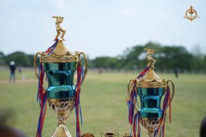 Winning trophy of Ranbhoomi Cricket Tournament at Brahmastra 2025 symbolizing intercollege sportsmanship and excellence.