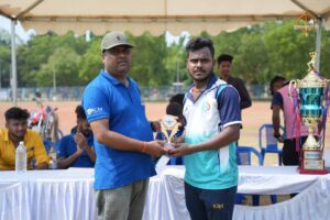 Trophy presentation ceremony at Ranbhoomi cricket tournament during Brahmastra 2025, showcasing winning team and dignitaries.