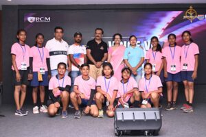 Throwball team group photo with organizers during Brahmastra 2025 award ceremony at RCM