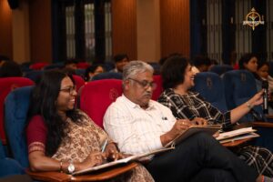 Judges reviewing notes during Navya Sopna entrepreneurial pitch session at Brahmastra 2025.