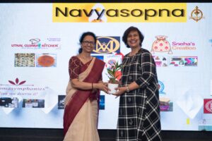 Plant distribution to women startup entrepreneurs during Navya Sopna at Brahmastra 2025 college festival.