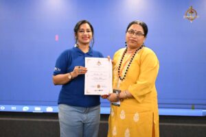 Faculty felicitating women startup entrepreneurs with certificates at Navya Sopna, Brahmastra 2025 college festival event.