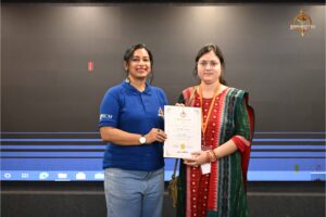 Faculty presenting certificates to women startup entrepreneurs during Navya Sopna at college festival Brahmastra 2025.