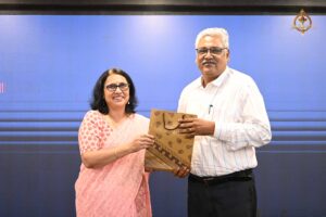 Judges receiving a token of appreciation during Navya Sopna at college festival Brahmastra 2025.
