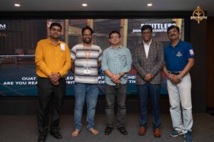 Group photo of faculty, judges, and guests during Navya Sopna at Brahmastra 2025 college festival event.