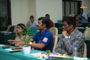 Faculty members and judges evaluating participants during the Recruitment Expo at Brahmastra 2025.