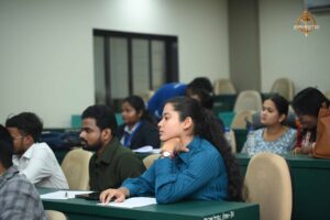 Participants engaged in strategic discussions during the simulated recruitment process at Brahmastra 2025 Recruitment Expo