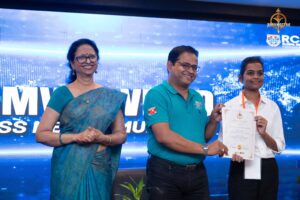 Faculty and judges distributing certificates at Samvad Vivaad during Brahmastra college festival in top management college.