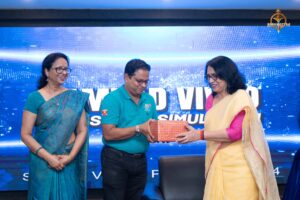 Faculty presents gift to event judge at Samvad Vivaad, Brahmastra—best college festival in India, RCM Bhubaneswar.