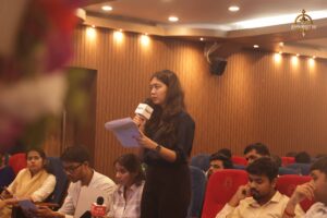 Student reporter interviews a public figure role-player during Brahmastra Samvad Vivaad college festival event.