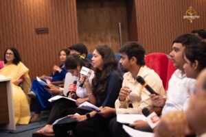 College students role-playing as reporters during Samvad Vivaad at Brahmastra, the best college festival in India.