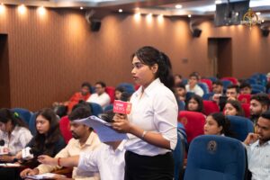Students at Brahmastra college festival role-play reporters during Samvad Vivaad at top management college