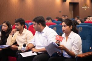 Student reporters interviewing participants role-playing public figures at the Brahmastra college festival, Samvad Vivaad event.