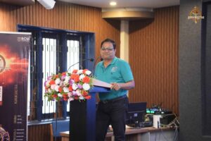 Judge addressing audience during Samvad Vivaad at Brahmastra, the best college festival in top management college India.