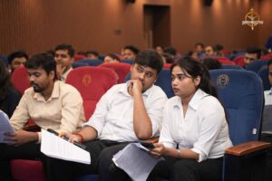 Student reporters at top management college festival Brahmastra discussing Samvad Vivaad event recap and highlights.