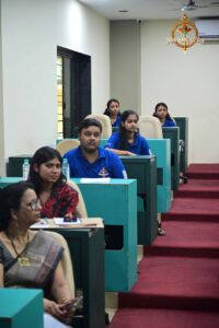 Students seated on stage at Vishwa Tark Vitark MUN during Brahmastra, best college festival in India.