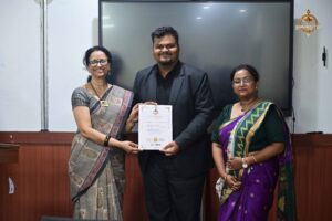 Participants receiving certificates from principal and faculty at Vishwa Tark Vitark, Brahmastra college festival event