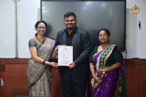 Vishwa Tark Vitark participants receive certificates from principal and faculty at Brahmastra, best college festival in India.