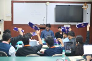 Participants representing countries raise boards at Brahmastra’s Vishwa Tark Vitark, India’s top college diplomacy festival.
