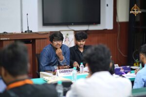 Judges observing Model UN participants during Vishwa Tark Vitark at Brahmastra, top management college festival in India.