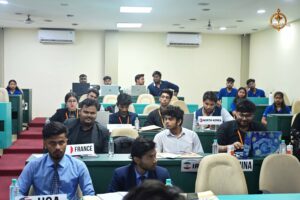 Participants at Brahmastra’s Vishwa Tark Vitark MUN event holding country boards at India’s top management college.