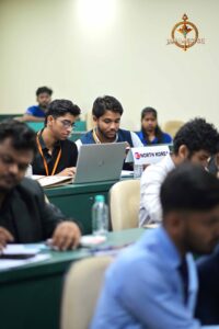 College festival Brahmastra 2025 participants discussing international policy during Vishwa Tark Vitark Model United Nations event.