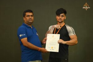Certificate distribution ceremony for participants of Brahmastra 2025 Kurukshetra Arm Wrestling event at Regional College of Management