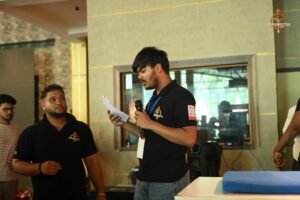 Arm wrestling competition at Brahmastra 2025 Kurukshetra event showing two participants in an intense match