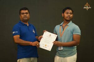 Certificate distribution ceremony at Brahmastra 2025 Kurukshetra Arm Wrestling event with participants receiving certificates from dignitaries on stage