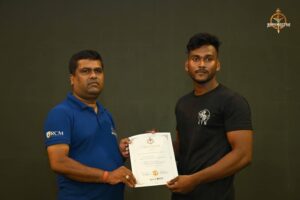Certificate distribution ceremony for participants at Brahmastra 2025 Kurukshetra Arm Wrestling event