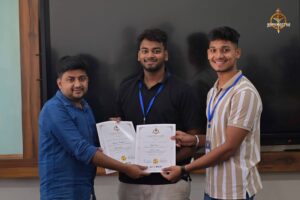 Students receiving certificates from judges at MetaWeb UI/UX Hackathon during Brahmastra, India’s best college festival.