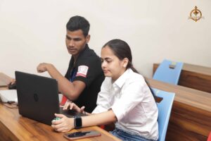 Students at Brahmastra college festival collaboratively designing UI/UX solutions during MetaWeb hackathon at top management college.