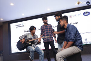 Student playing guitar during AI workshop cultural break
