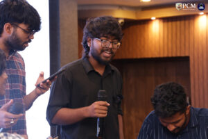 Students doing a creative group activity in classroom workshop