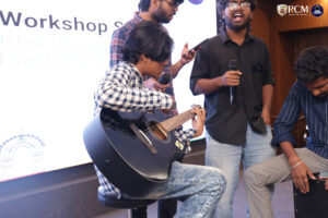 Group of students laughing during an interactive session game