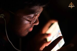 Participant focused on gaming competition during Kurukshetra BGMI event.