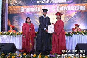 Graduate receiving certificate at 2025 MBA/MCA ceremony, Regional College of Management.