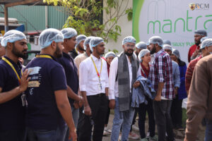 Students observing ethical dairy operations at Milk Mantra visit