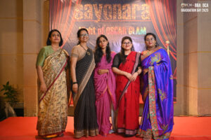 Five women in colorful sarees posing at RCM BBA BCA Graduation Day 2K25 event.