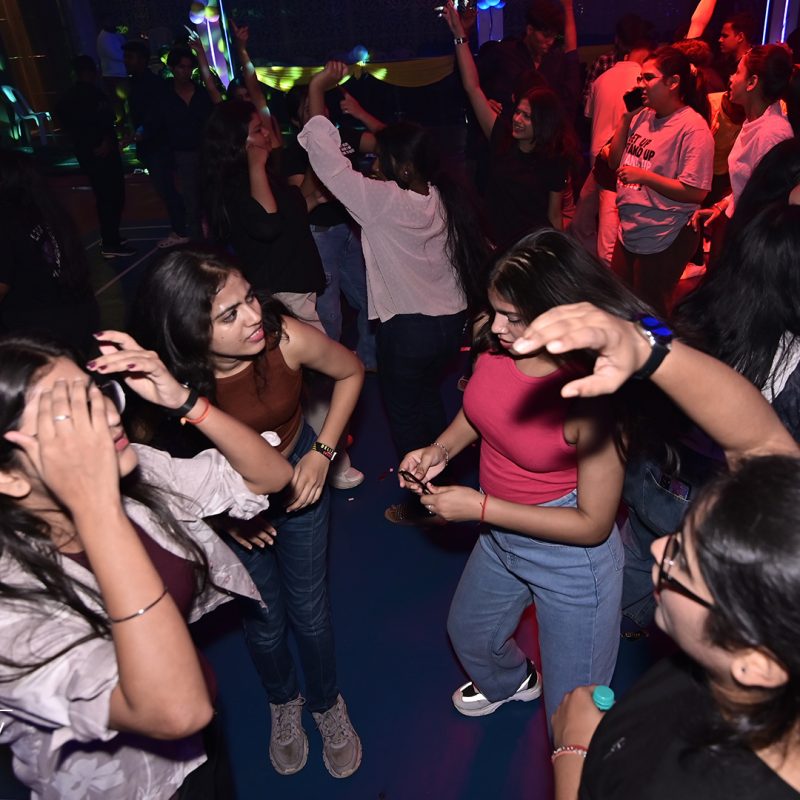 Girls dancing at a college festival