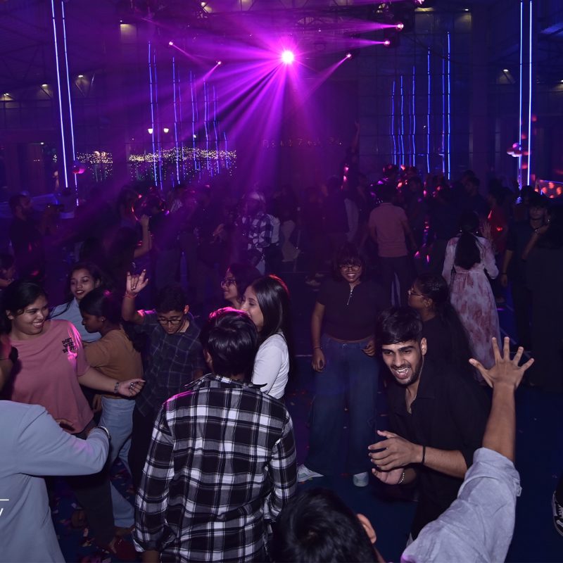 Students dancing at a college freshers party.