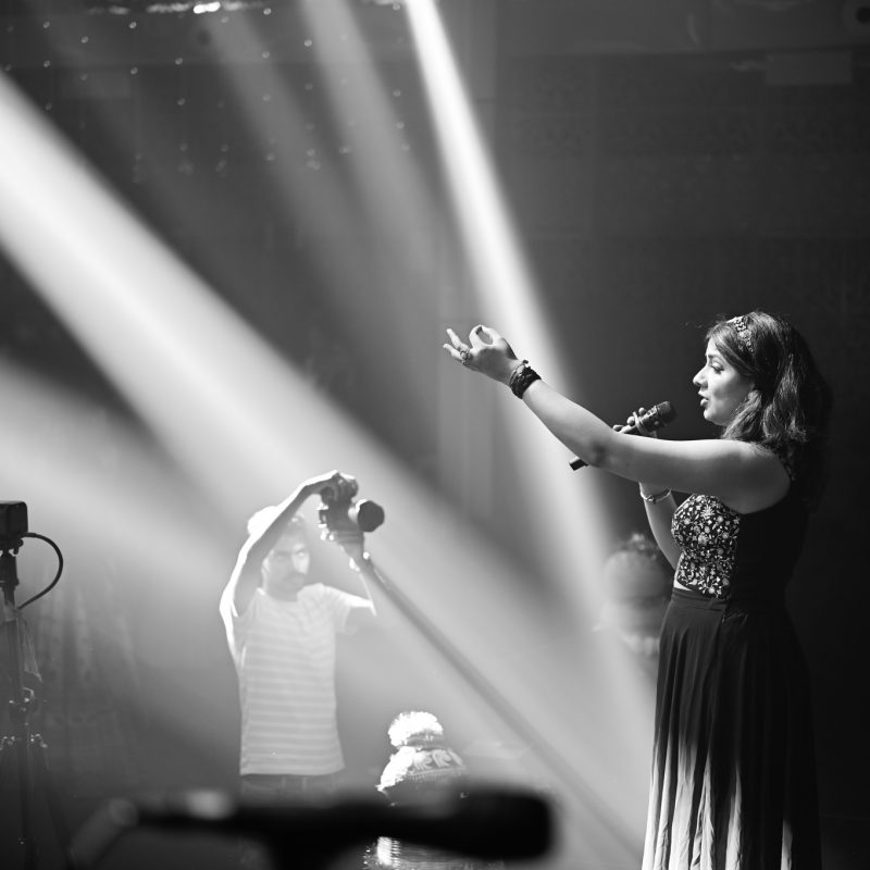 Mega Dandiya Night 2025 live performance by Sugyani with students enjoying music and dance celebration.