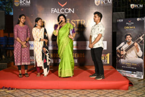 Students performing solo songs during Voice Voyage Brahmastra 2026 annual college cultural festival at RCM