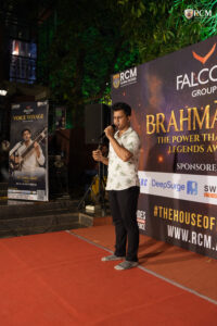Students performing solo songs during Voice Voyage Brahmastra 2026 annual college cultural festival at RCM